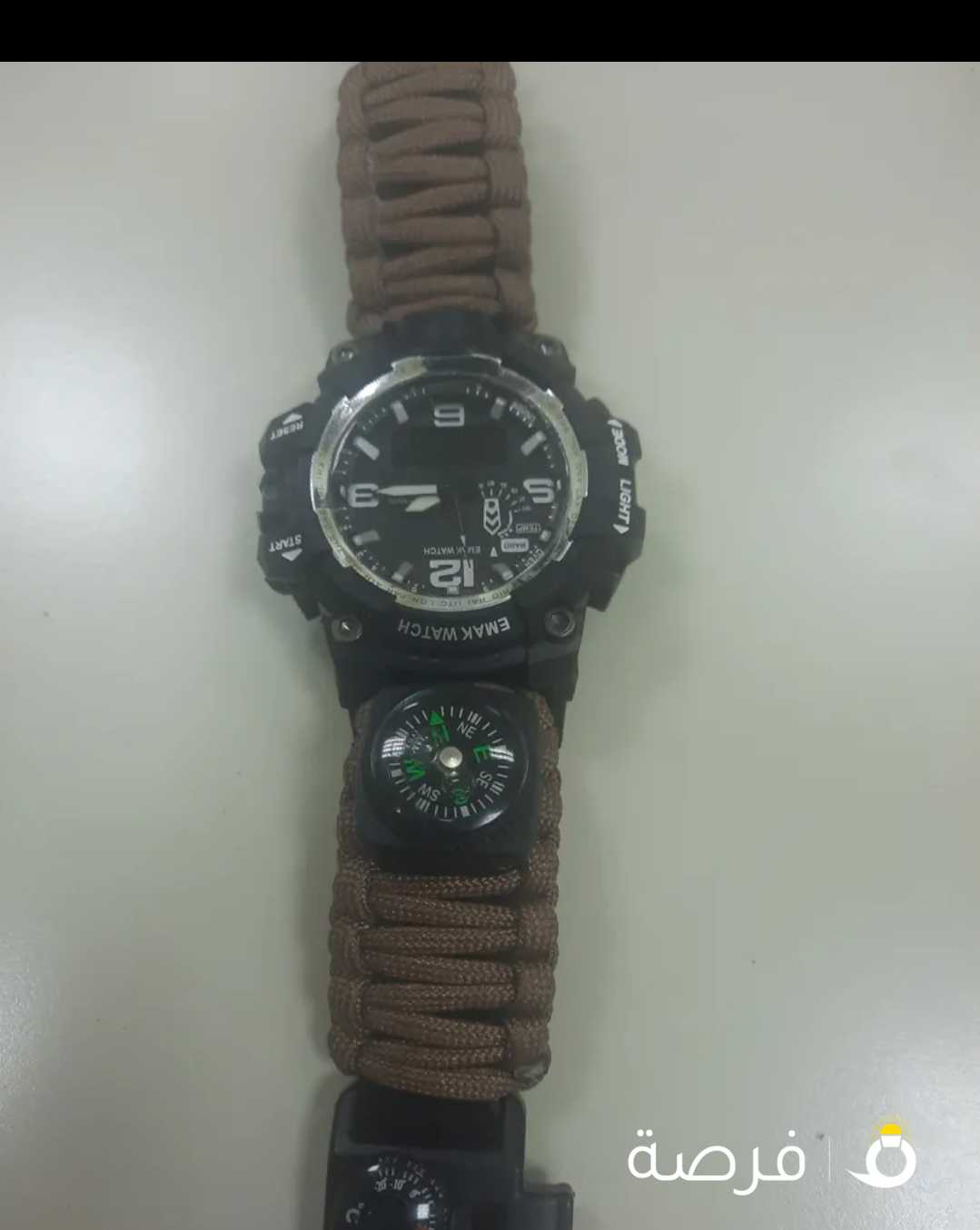 ساعة ماركة Emak watch بها بصله جديدة الاستيكرات عليها