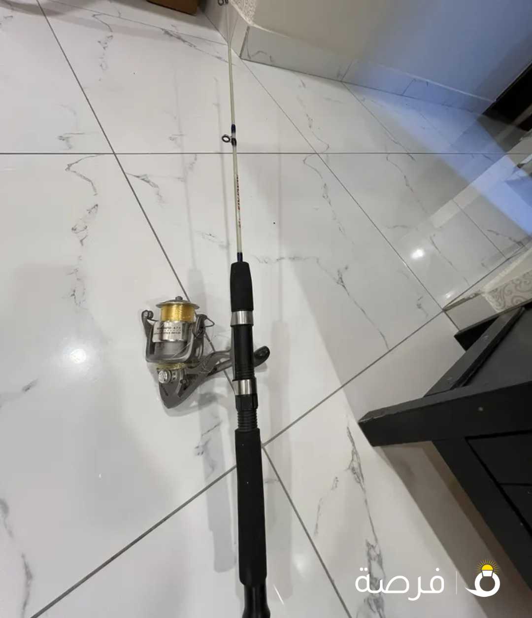 صنارة صيد شبه جديدة