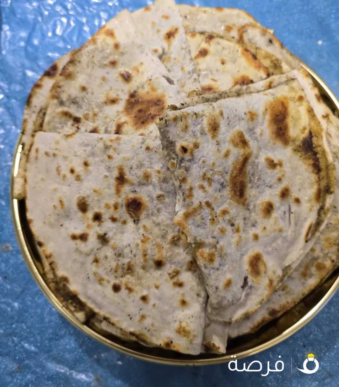 خبز صاج مهياوة بالزبدة او زيت زيتون او دهن عداني مهياوة اجار ثوم يبل مع طماط او بدون طماط كيلو 25حبة