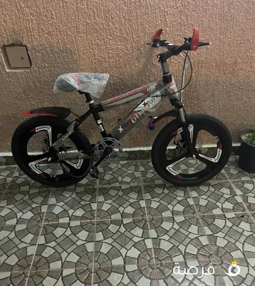 دراجة نارية اللون احمر جديد السعر 40دنيار