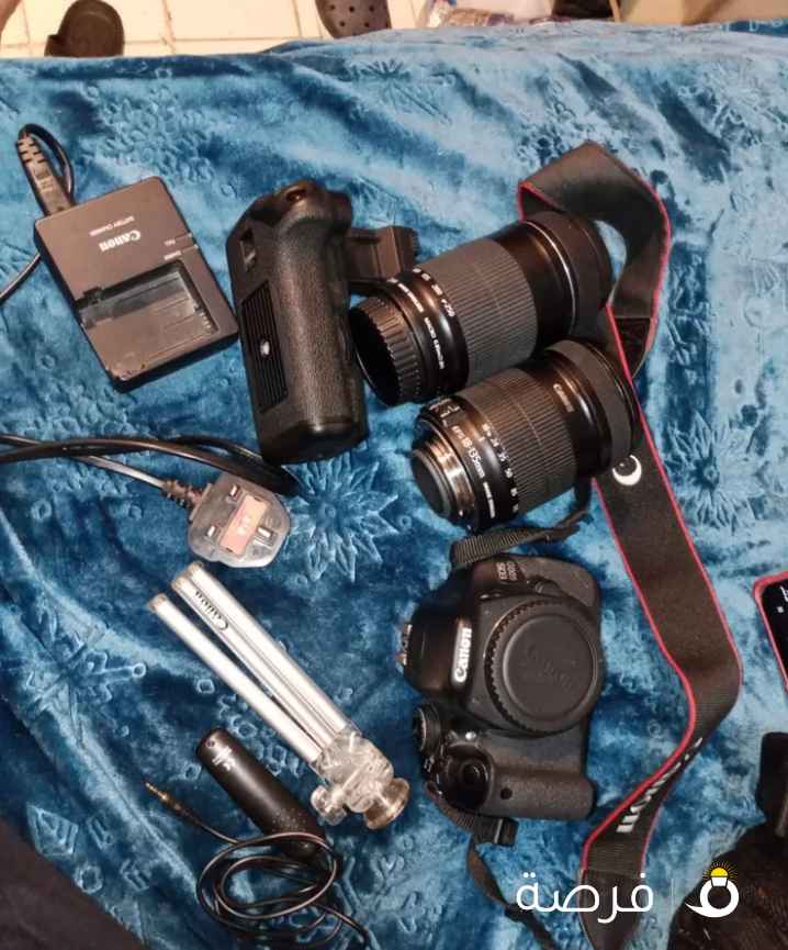 للبيع كامره النوع من كانون 600بحاله كل جديد الكامره مافيه اي قصور معه 2عدسه مع حامل بطاريه عامودي