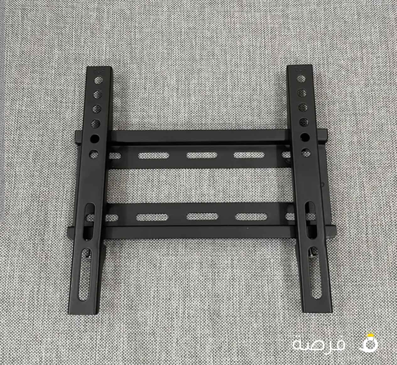 تعليقة حائط لتلفزيون حتى مقاس 36 انش مع ميزة التركيب من بعد قليل من الحائط