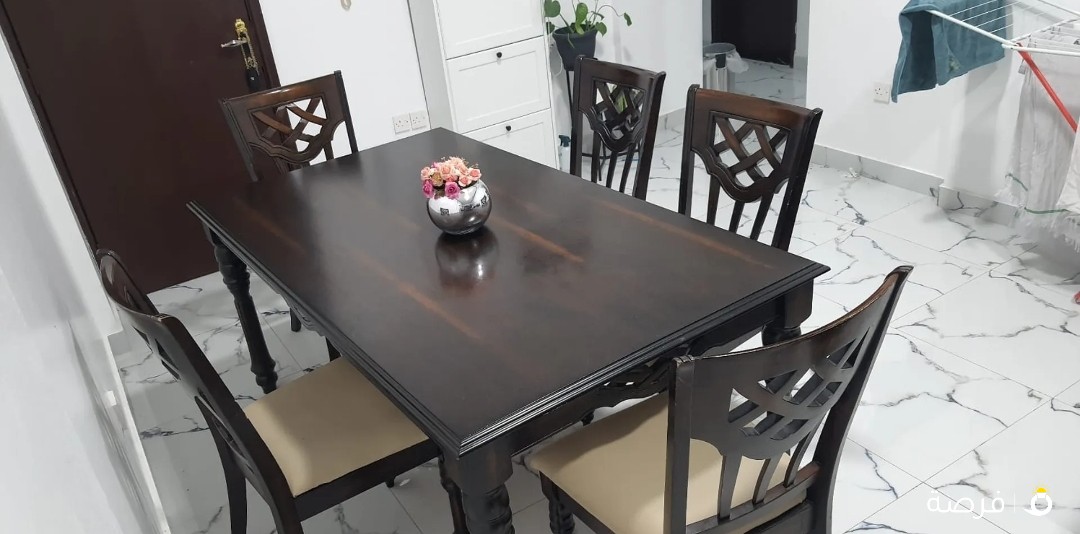 Dinning Table with 5 chairs. well maintain. Dimension 180×100cm