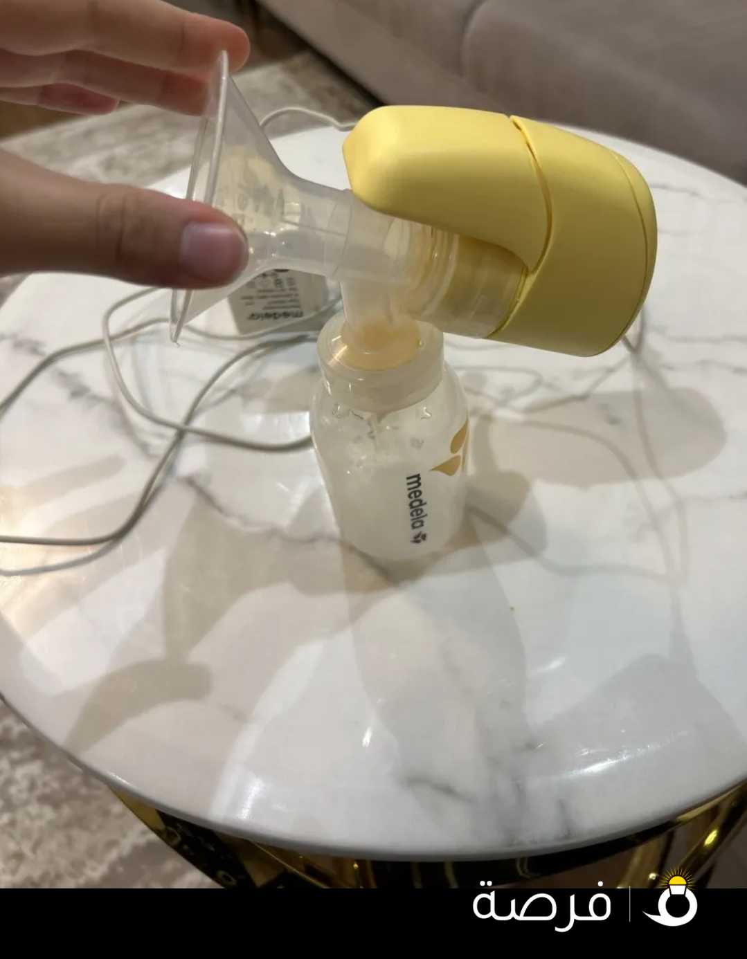 مضخه حليب استعمل خفيف اقل من شهر ماركه medela