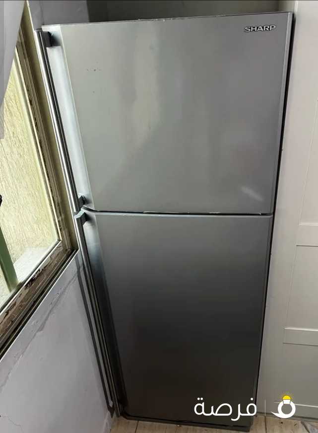 Lightly used sharp refrigerator clean in perfect condition URGENT SELL