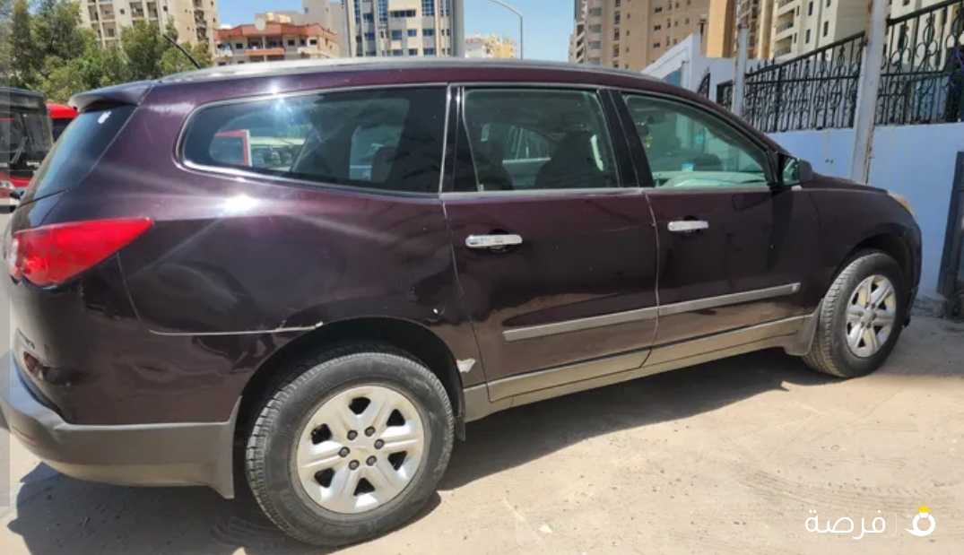 Chevrolet Traverse 2010 Cherry Color, only 106000 km run, accident free, well maintained family (Indian) car.