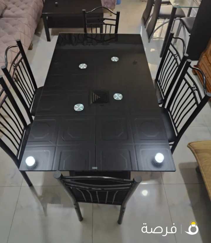 Table with 6 chairs for sale in excellent condition