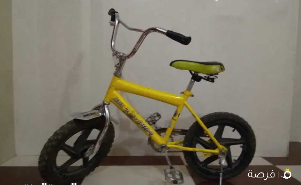 عجلة صفراء مقاس 16 فى حالة جيدة - midsize bicycle (size 16)