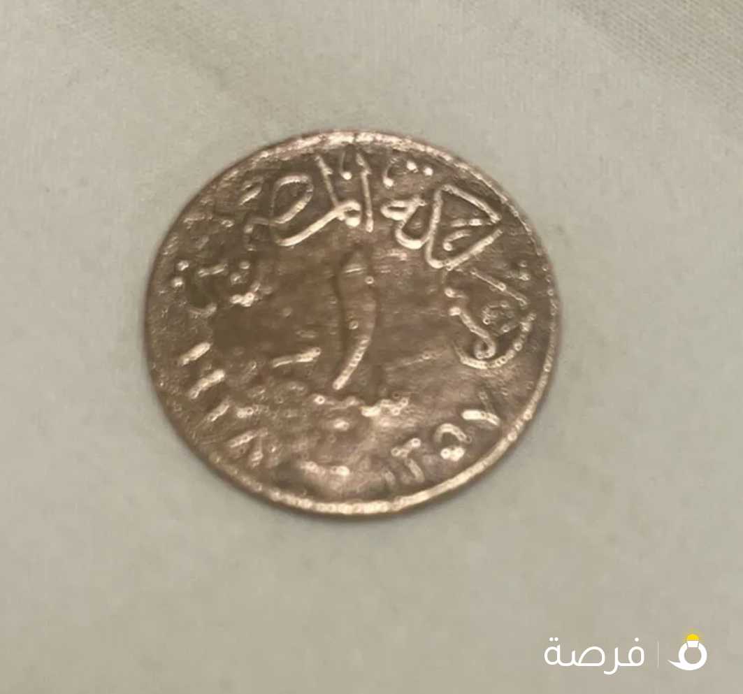 عملة معدنية فئة مليم من عهد الملك فاروق تاريخ 1938 ميلادي أي قرب علي تسعون سنة العملة عليها صورة الملك