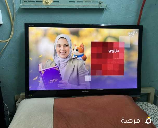 للبيع شاشه شارب 32 بوصه مع الريموت وريسيفر لا يوجد بها خدوش المكان بالأحمدى المنقف