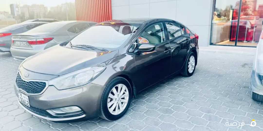 كيا سيراتو 2015بحالة ممتازه 1600سي شرط الفحص