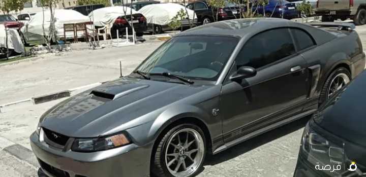 للبيع موستانج 2003 قير عادي لون سموك سيلفر عليه دعامية كوبرا (معاه قطع غيار جديده في الكرتون)‎