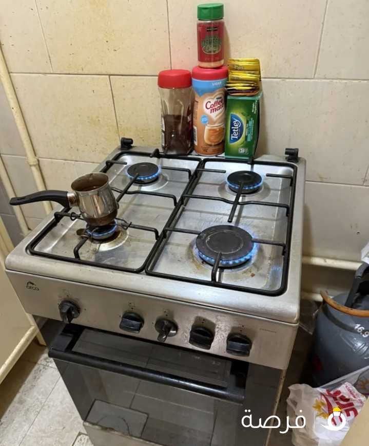 طباخ 4 شعله مع فرن و انبوبه غاز