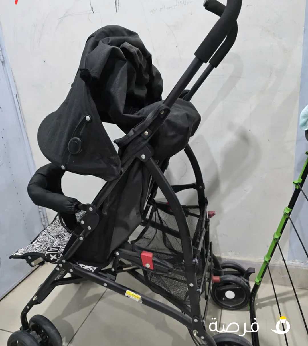 سيارة أطفال مستعملة بحالة جيدة