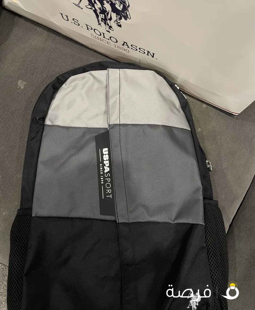 شنطه جديده ما استعملته ابداً مع كيس بولو بس معفس شوي