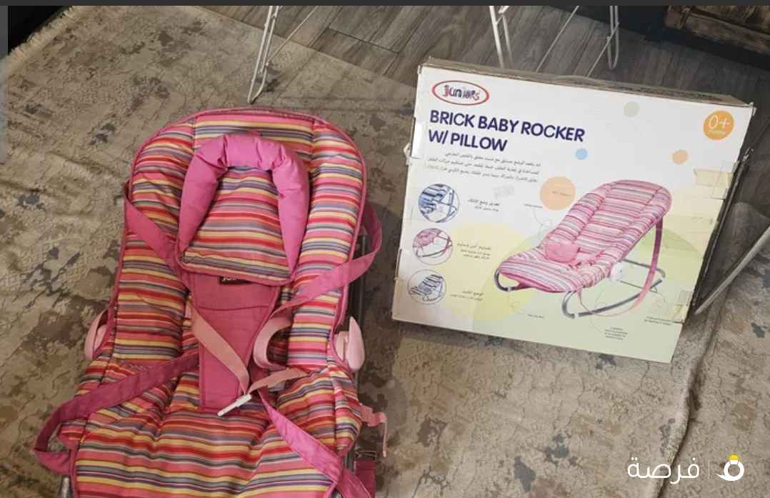 مستعمل كرسي هزاز للأطفال مع وسادة من جونيور لون وردي للبيع. Juniors Brick Baby Rocker with Pillow