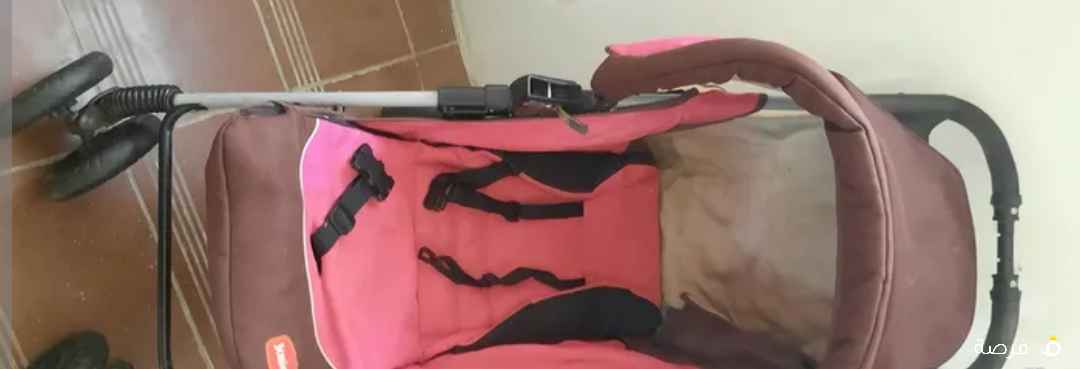 فرصة مميزه ** عربانة أطفال مستعملة أصليه ماركة جونيور بحاله جيده جدا معاها كرسي السياره الاصلي