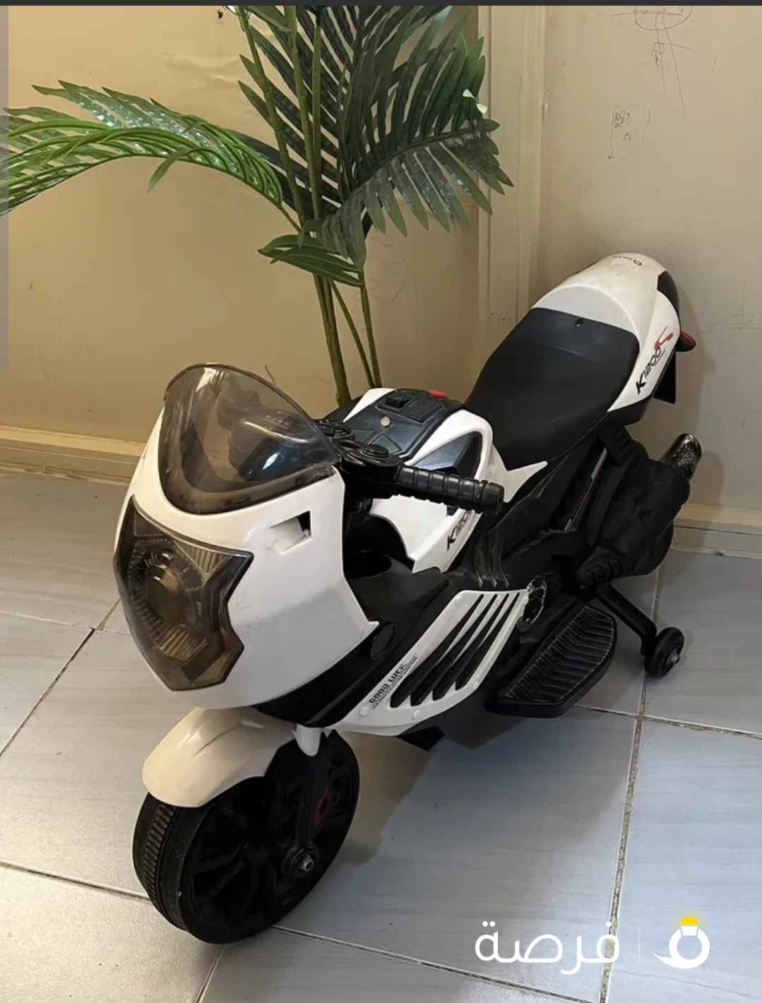 سيكل أطفال مستعمل بحالة الجديد معاه شاحن لون ابيضxاسود