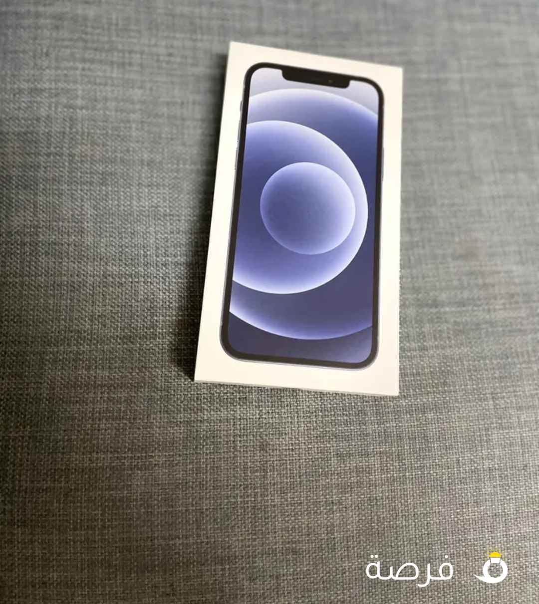 آيفون 12 عادي ومعاه كرتونه وبطاريه 99 والون الأسود