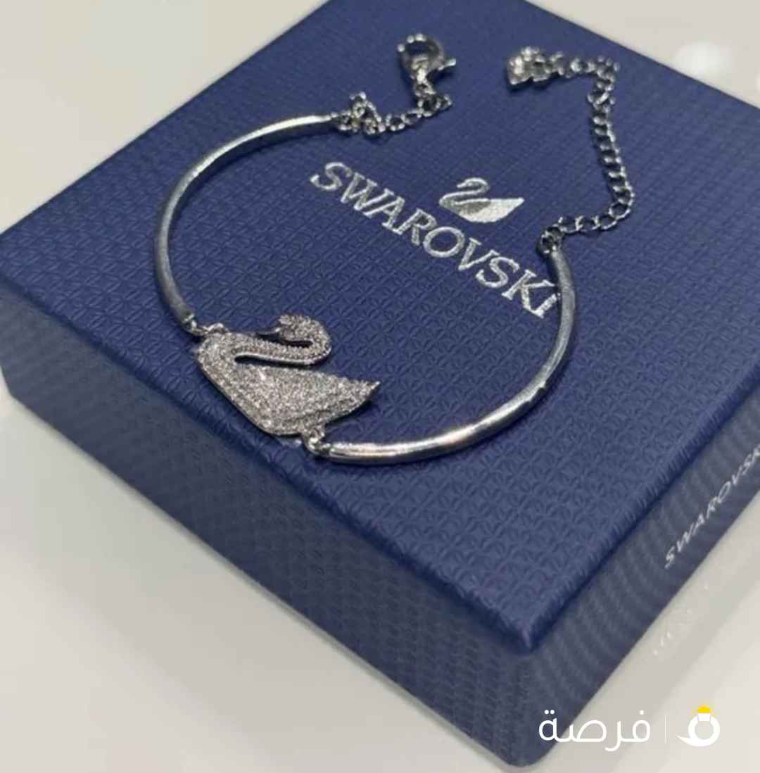 سوارة يد شوارفسكي جديدة بعلبتها مع القرنتي