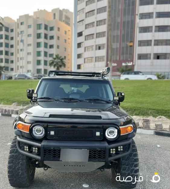 تويوتا FJ موديل 2012 الموتر مجهز بالكامل وبحالة جدا ممتازة تبارك الرحمن شرط الفحص
