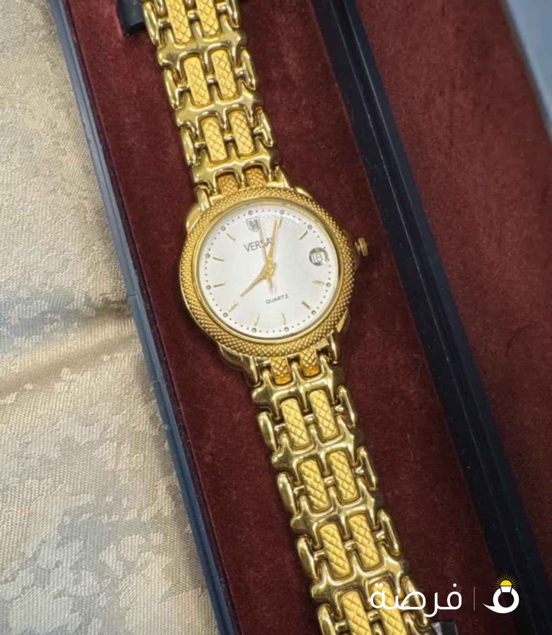 Versay golden watch