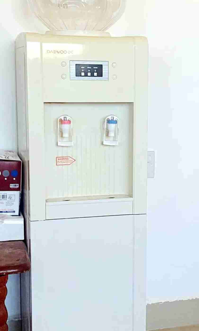 water dispenser (hot/cold) with storage. daewoo brand