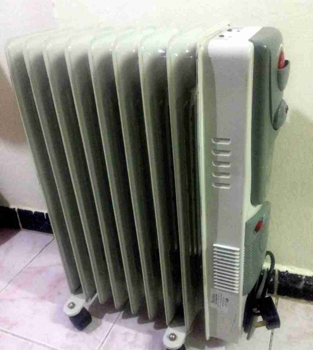 دفاية زيت مزوّدة بمروحة Electric Heater with fan