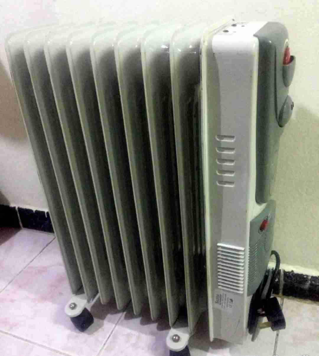 دفاية زيت مزوّدة بمروحة Electric Heater with fan