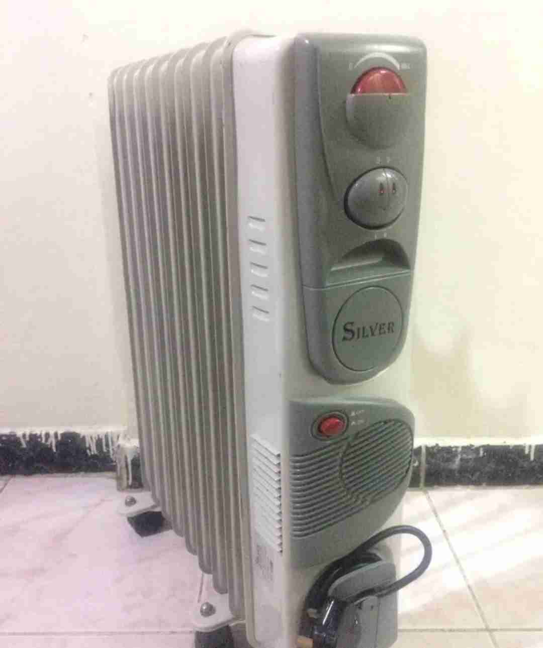 دفاية زيت مزوّدة بمروحة Electric Heater with fan