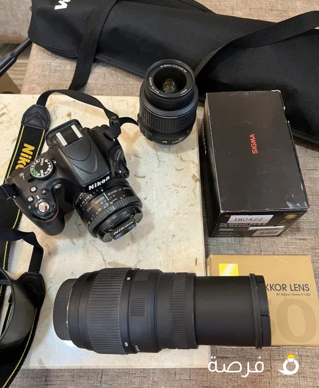 Nikon d5100 مع مرفقات