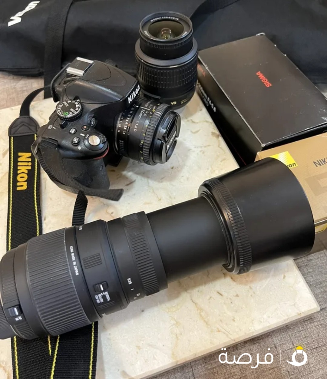 Nikon d5100 مع مرفقات